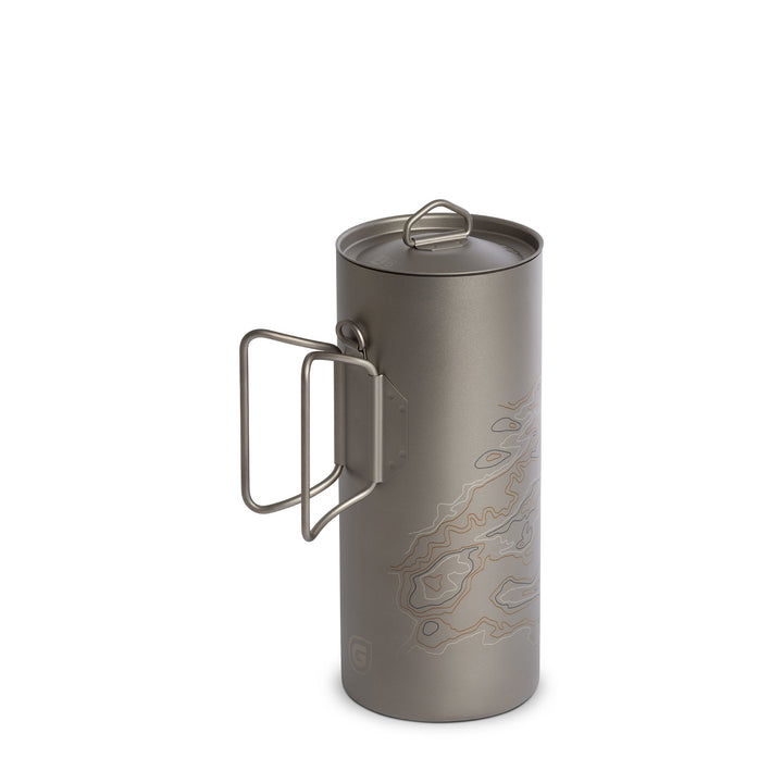 GeoPress® Titanium Cook and Straining Lid sitting on top of G-Ti Outer Cup