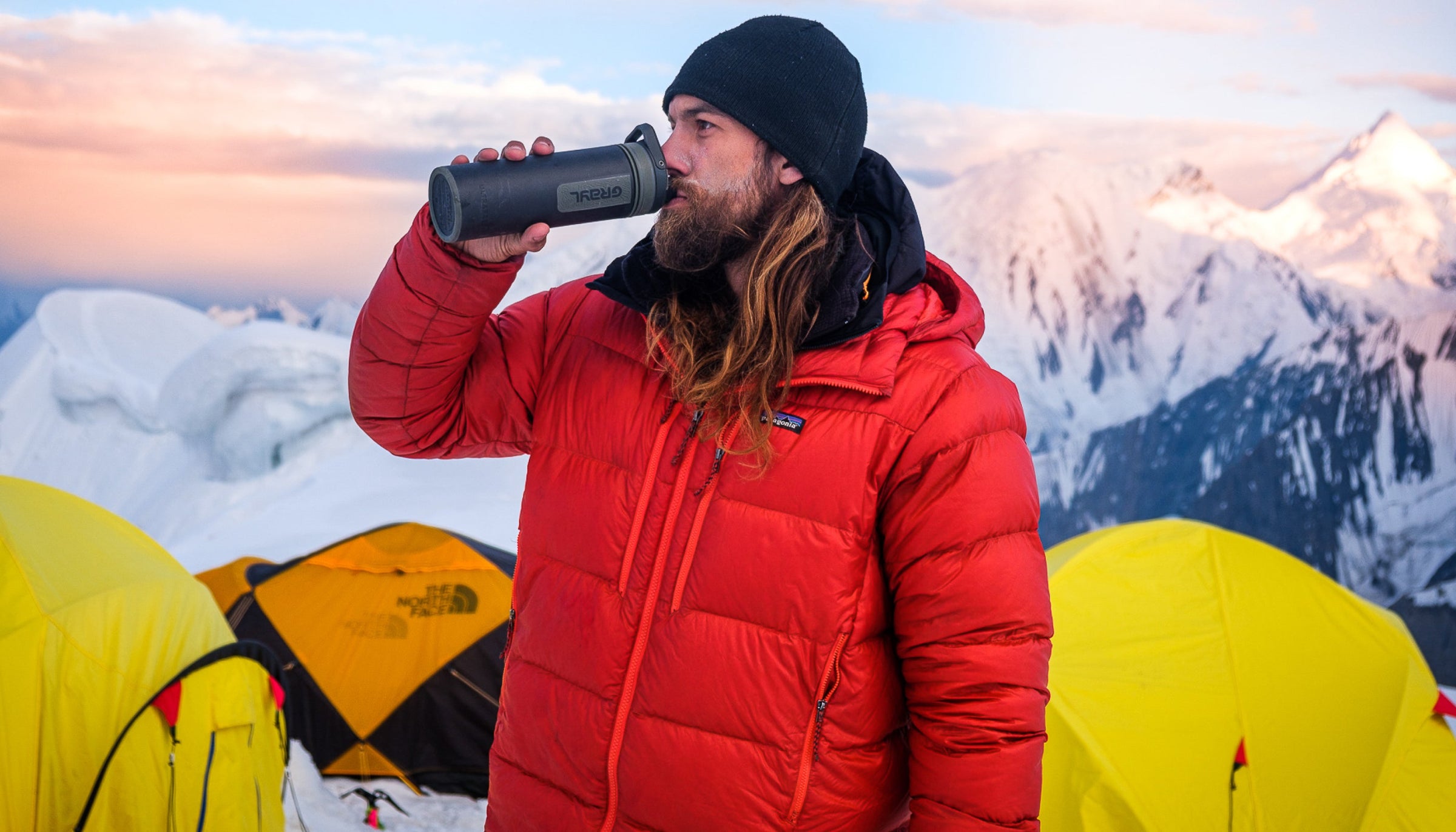 Drinking from an UltraPress at basecamp in Pakistan