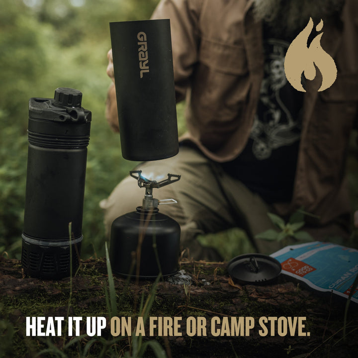 Heat it up on a fire of camp stove.