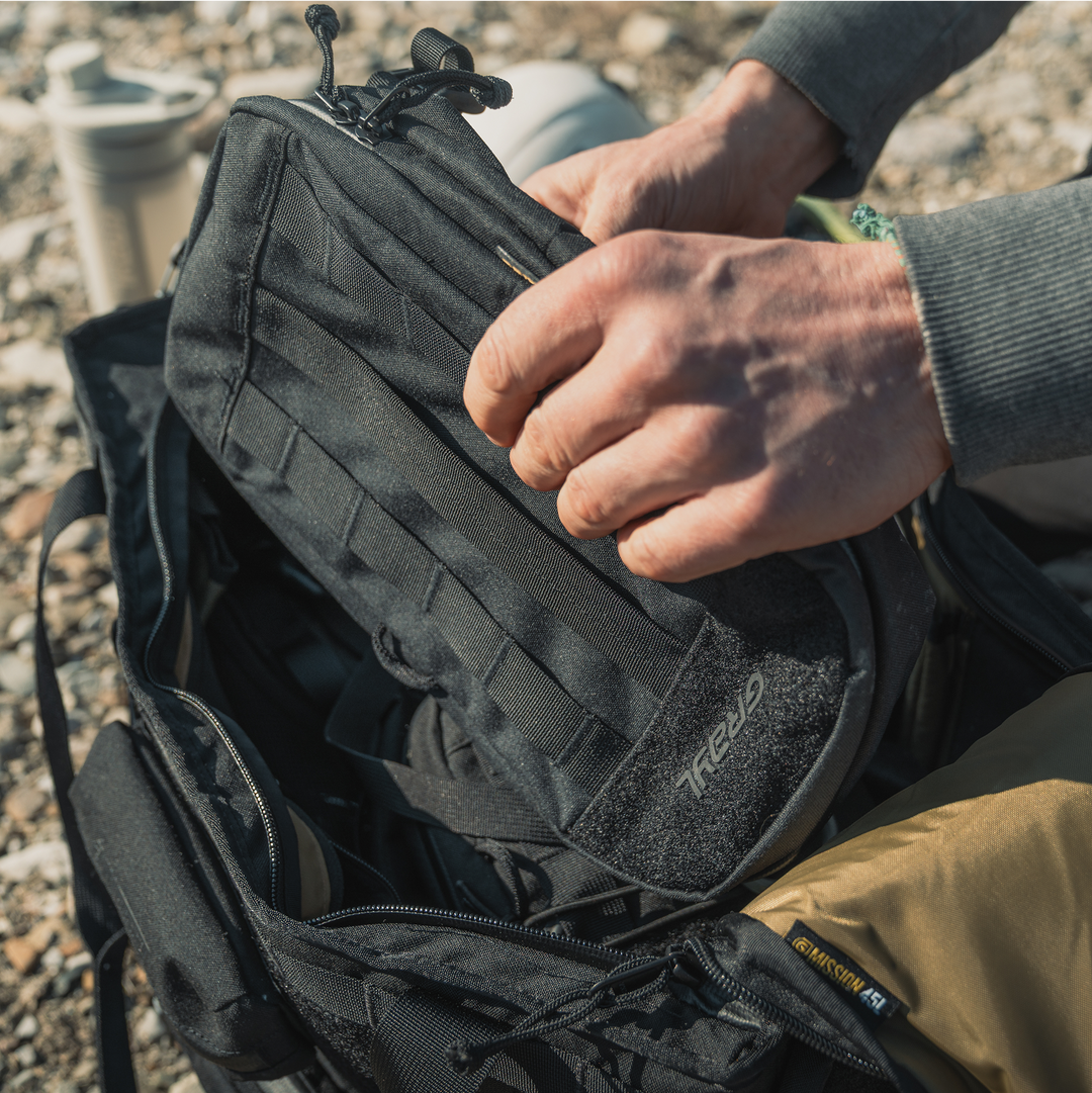 Ample capacity for packing pouches and storage.