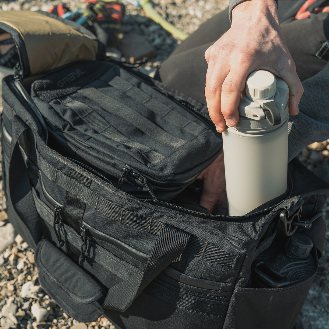 Internal 3D bottle and accessory pockets.
